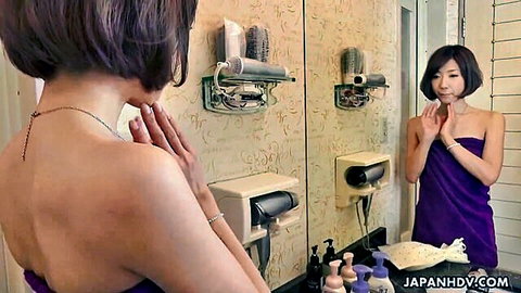 Erina Takigawa in purple towel, sensual bathroom mirror pose