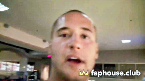 Cute shaved-head teen guy with horny expression in indoor setting