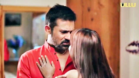 Intense Indian man squeezes woman's tits from behind in passionate clothed embrace