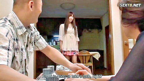 Clothed Japanese teen in short pink skirt holds hand with older Asian man in kitchen as woman watches