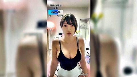 Busty Korean amateur with huge tits in skimpy black bra top and white thong panties teasing cleavage