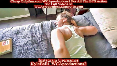 Tattooed MILF Clover Baltimore resting on bed in tank top