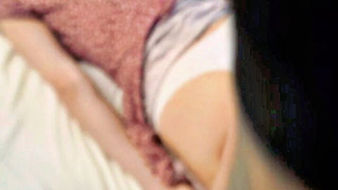 Alisa Wonderland topless during massage, panties on, intimate bedroom scene
