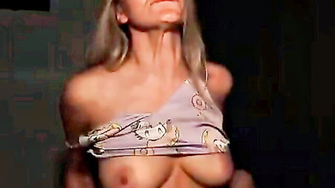 Blonde big tits babe arches back topless exposing huge bare breasts