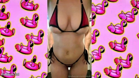 Christina Khalil in skimpy red string bikini with pink flamingo floats