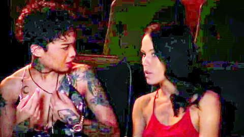 Megan Rain and Honey in intimate lesbian chat, cleavage tease