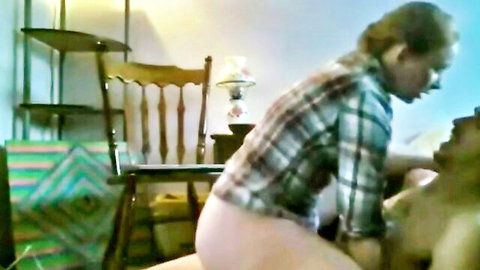 Amateur woman in plaid shirt straddles naked man showing bare ass and pussy in homemade fuck