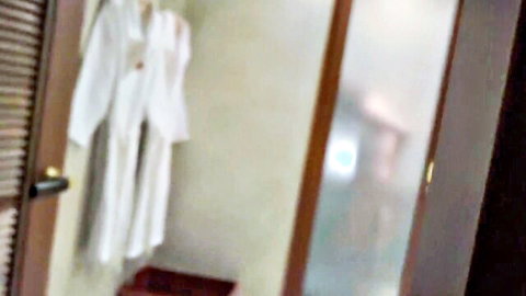 White robe hanging in steamy bathroom, teasing amateur JAV scene