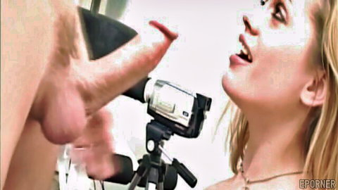 Blonde babe with open mouth stares at huge hard cock held near her lips for POV blowjob filmed on camcorder