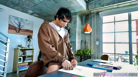 Zane Walker drawing at desk in hoodie, from Addison Vodka reverse cowgirl sex video
