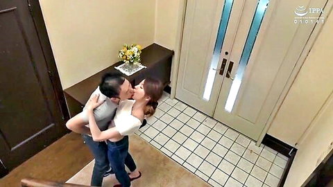 Beautiful Japanese stepmom passionately kissing in intimate embrace