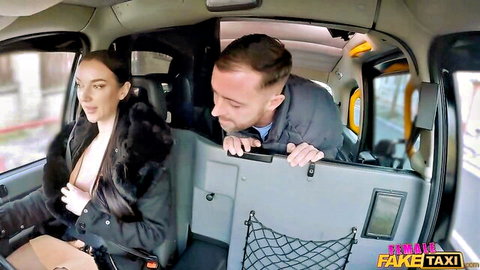 Brunette babe exposes her perky tits to grinning Fake Taxi driver in cab