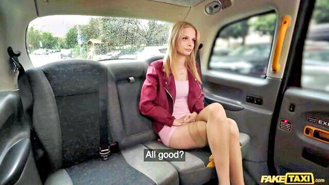 Naomi Love in seductive taxi pose, blonde in stockings and short skirt