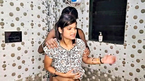 Sensual Indian pregnant woman embraced from behind by lover in steamy shower foreplay