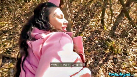 Sexy Asian Nala in pink jacket smiles outdoors in Public Agent tease video