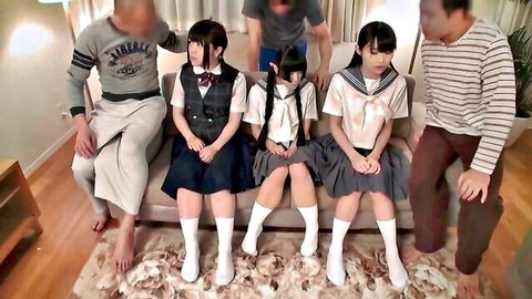 Petite Japanese schoolgirls in sailor uniforms and knee socks groped by men on couch