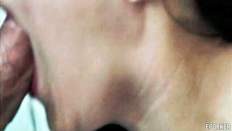 Closeup of woman's stretched mouth gripped roughly during intense blowjob with drool dripping