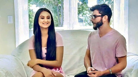 Curious Indian MILF in pink dress chats with bearded neighbor on couch