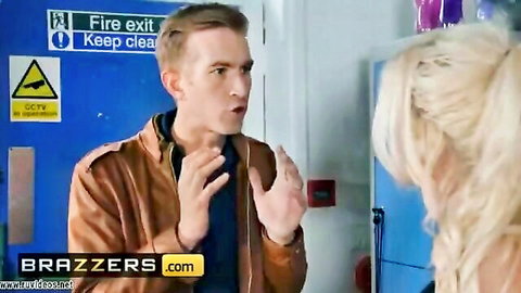 Handsome stud in leather jacket gestures at busty blonde in locker room near fire exit