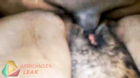 Blurry closeup of spread white pussy with dark vaginal opening and pink inner labia