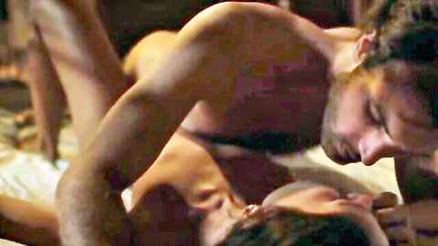 Bearded muscular man fucking naked woman prone bone style from behind on bed