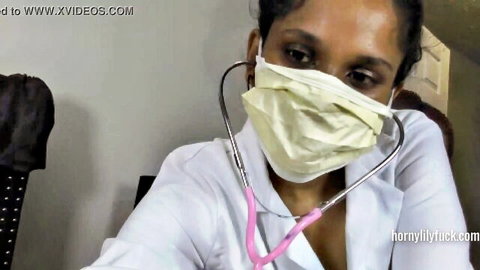 Horny Lily as sexy South Indian doctor in white coat and mask with stethoscope