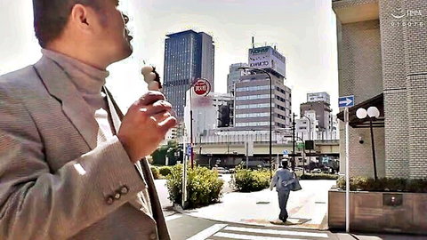 Man in suit eating ice cream on urban Japanese street, JAV teaser