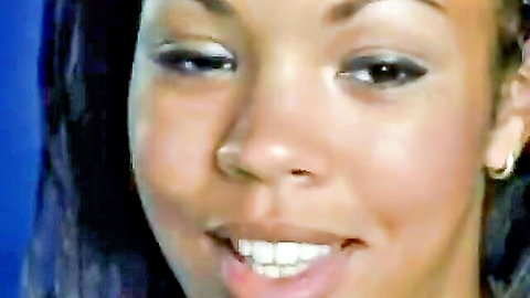 Smiling young ebony beauty close-up, hot interracial adult teaser