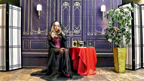 Sally D'Angelo mature blonde in sheer black lingerie and veil, seductive pose