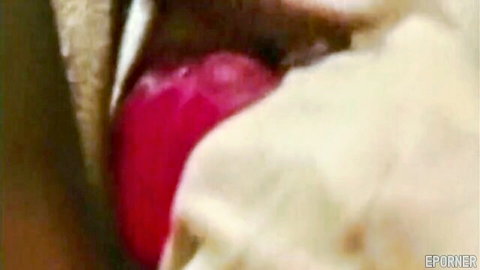 Retro lesbian close-up oral action with extended tongue