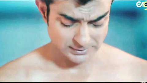 Shirtless Indian man intense gaze in Room No. 69 Hindi porn series