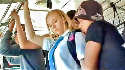 Young blonde schoolgirl in uniform groped by men on crowded public bus