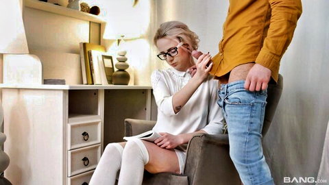 Hanna Rey in glasses teases cock in skirt and stockings