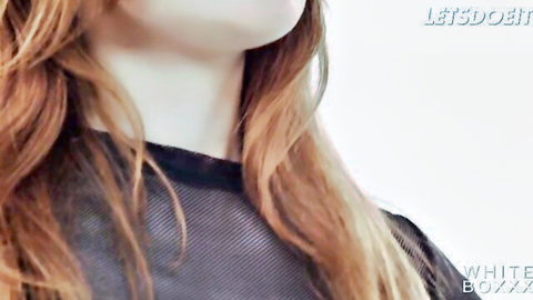 Redhead Jia Lissa close-up in black mesh top, sexy portrait
