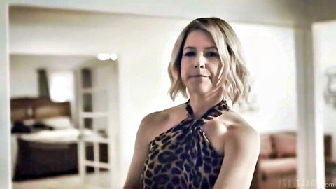 Blonde stepmom in leopard halter dress, mature woman posing seductively