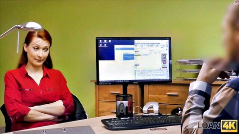 Redhead client flirts with loan agent in office, big tits tease