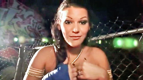 Angelina Castro topless in MMA cage, seductive fighter pose