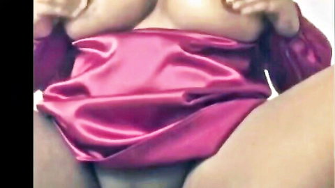 South Asian babe with huge dark tits spreads pink satin robe exposing massive chocolate breasts and erect nipples
