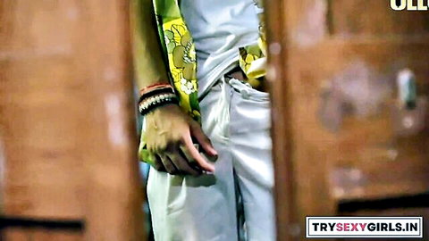Indian man teasing with hand on white pants in Khilona part-3 web series
