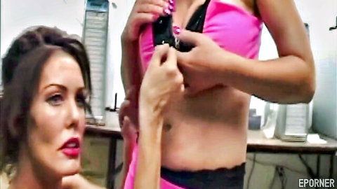 Vintage MILFs in pink lingerie adjusting bustier
