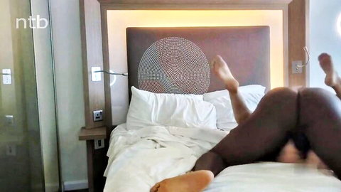 Ebony MILF legs spread exposing pussy in amateur interracial BBC threesome