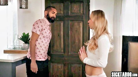 Petite blonde babe in cropped white top and pink panties stands namaste before bearded man in pink flamingo shirt