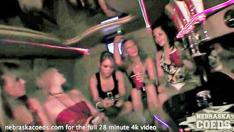 Four bikini-clad Nebraska coeds partying in a limo with drinks and neon lights