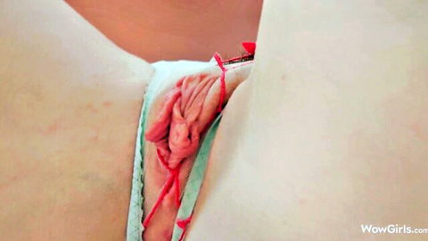 Agatha Vega's close-up pink pussy exposed in pulled-aside lingerie