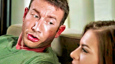 Sweaty Caucasian guy with intense shocked face as brunette babe gets close on couch