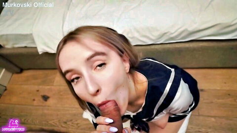 Blonde busty student in sailor uniform gives POV blowjob on dildo