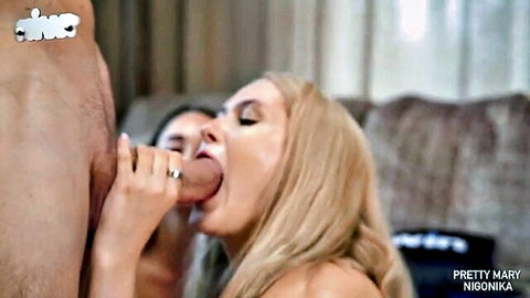 Blonde Pretty Mary sucks thick cock deeply while brunette licks balls in steamy threesome blowjob