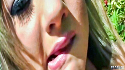 Sativa Rose seductive close-up with parted lips in adult video