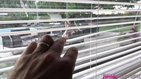 Tyler Steel peeking through blinds at taboo sister by pool
