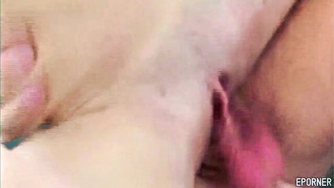 Close-up of pink wet pussy spread open with fingers inserted during fingering